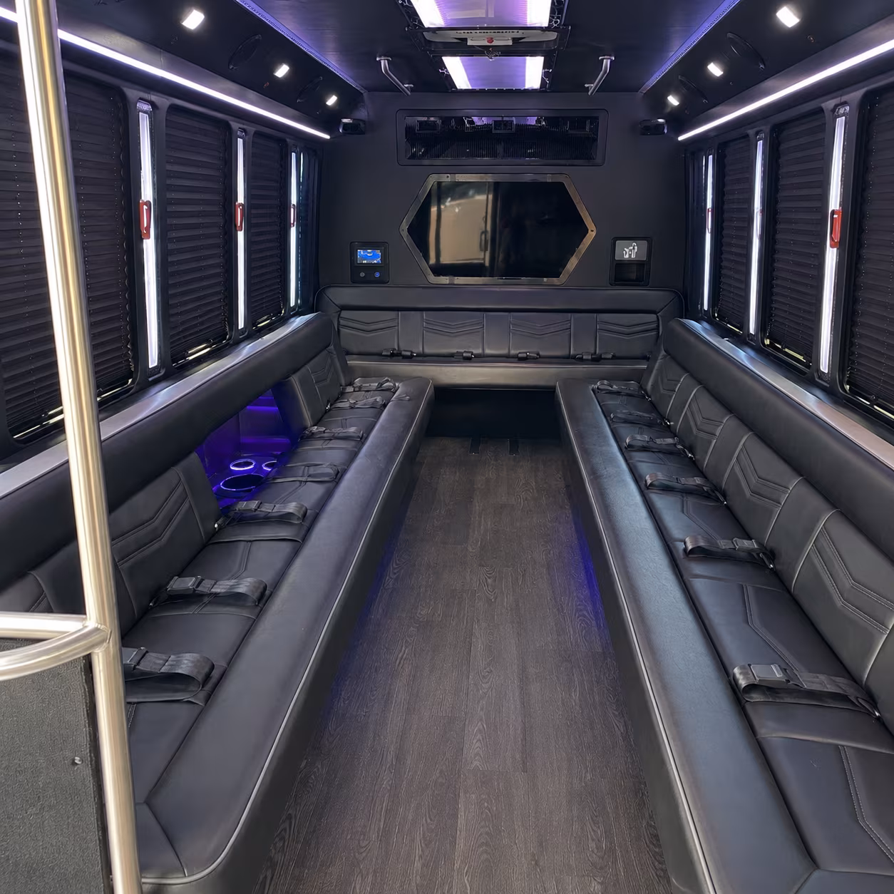 Group beside a Mercedes Sprinter limo in Boston