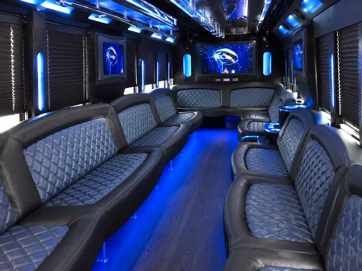 Wedding guests seated inside a party bus serving Boston
