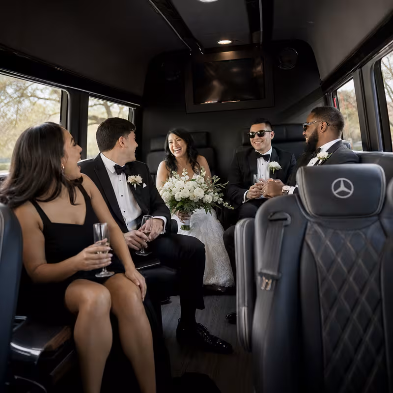 Black Mercedes Sprinter van staged for an Boston Wedding Transportation group